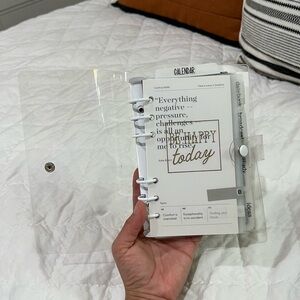 Personal size transparent binder with white rings